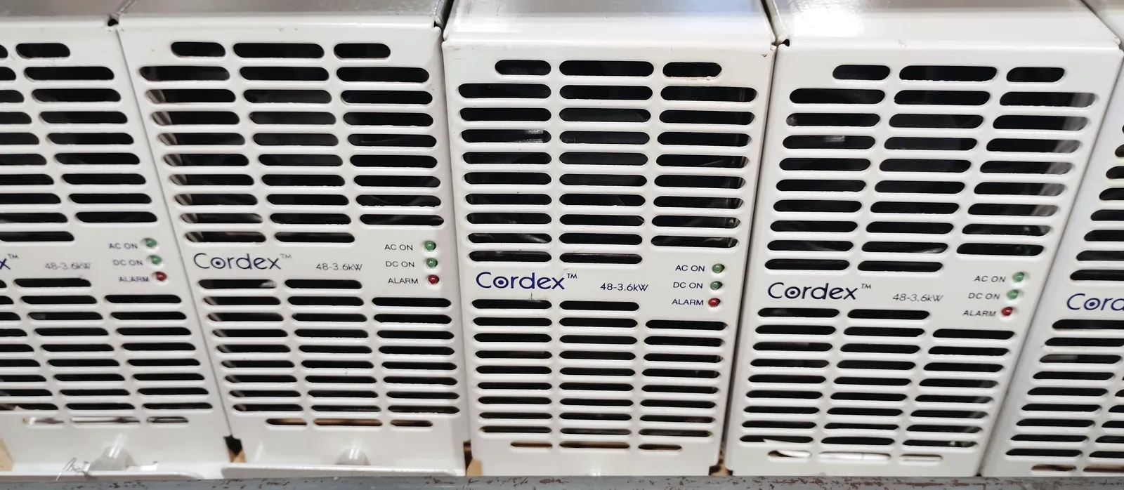 Alpha Cordex 48-3.6kW telecom rectifier modules at the Advanced Technical Services repair depot in Glendale Heights, Illinois